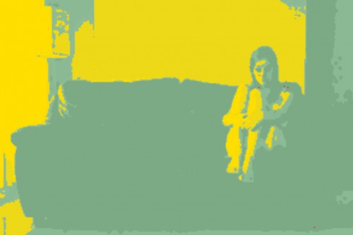 DAME ON SOFA-GREEN AND YELLOW..jpg